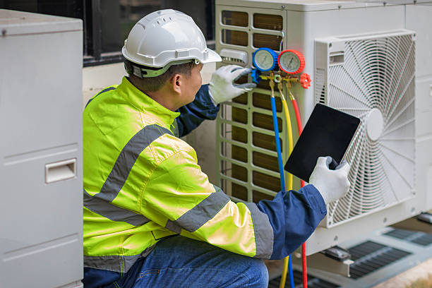 Professional Hvac technician working in New Town, MA